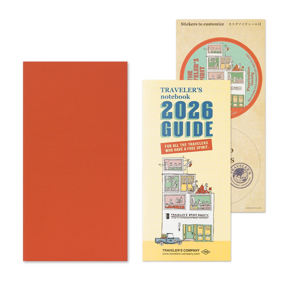 TRAVELER'S notebook Regular size insert 2026 Monthly planner.shown together with the TRAVELER'S notebook  2026 guide and sticker set