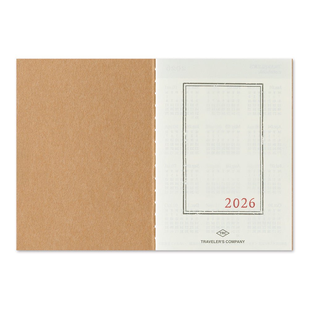 TRAVELER'S notebook Passport Size 2026 Monthly Planner insert. Showing planner open on the title page 