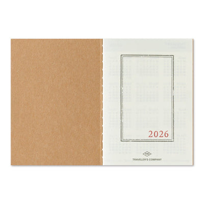 TRAVELER'S notebook Passport Size 2026 Monthly Planner insert. Showing planner open on the title page 