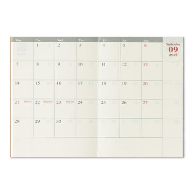 TRAVELER'S notebook Passport Size 2026 Monthly Planner insert. Showing planner two page block monthly layout.