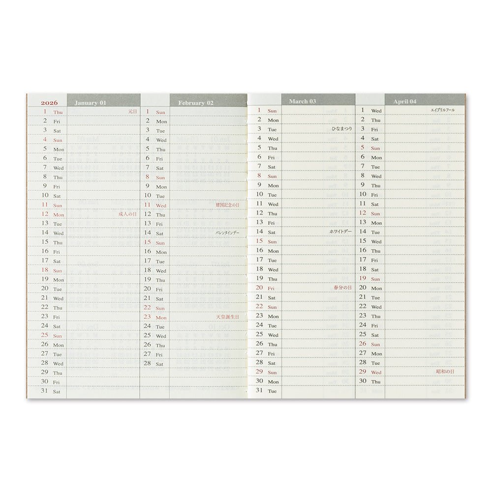 TRAVELER'S notebook passport size 2026 planner with horizontal week over two pages layout. Showing the yearly planning pages