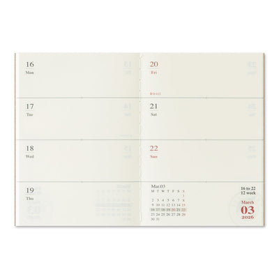 TRAVELER'S notebook passport size 2026 planner showing the horizontal week over two pages layout
