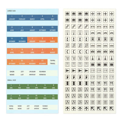 TRAVELER'S notebook Calendar and organizational page tabs and a sticker sheet with travel icons